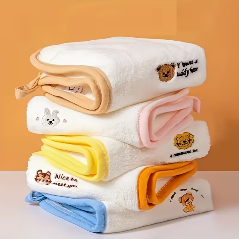 A set of 5 ultra-soft coral fleece towels