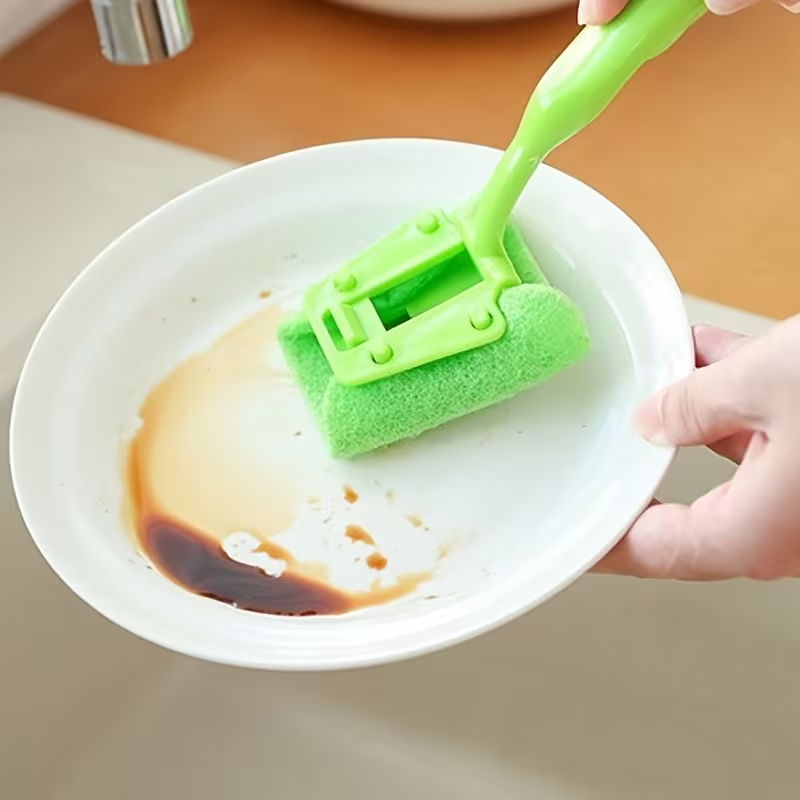 Dishwashing brush that won't scratch sponges, with an ergonomic handle.