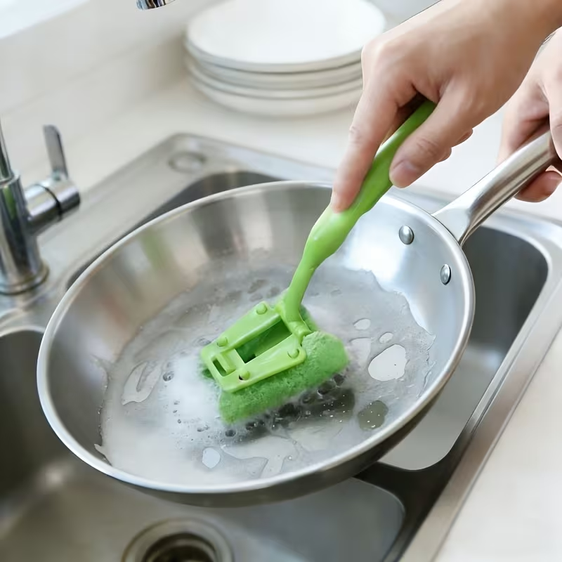 Dishwashing brush that won't scratch sponges, with an ergonomic handle.